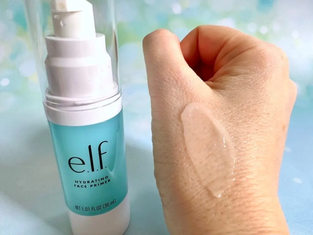 e.l.f. Hydrating Face Primer bottle next to sample on hand.