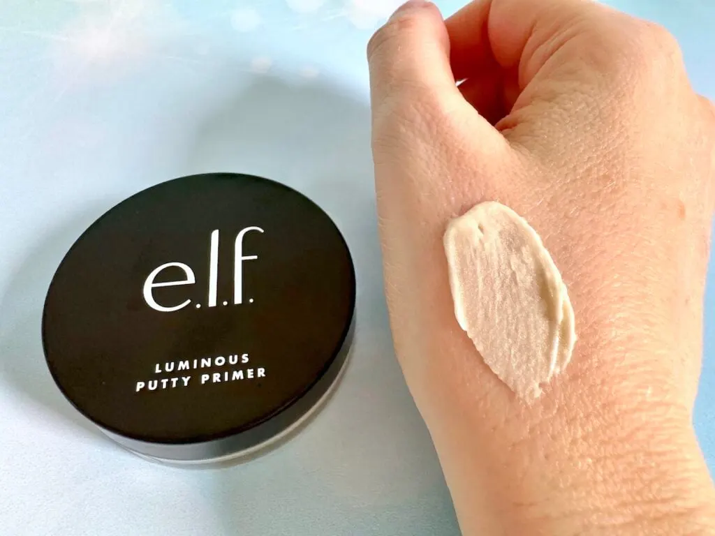 e.l.f. Luminous Putty Primer jar next to sample on hand.