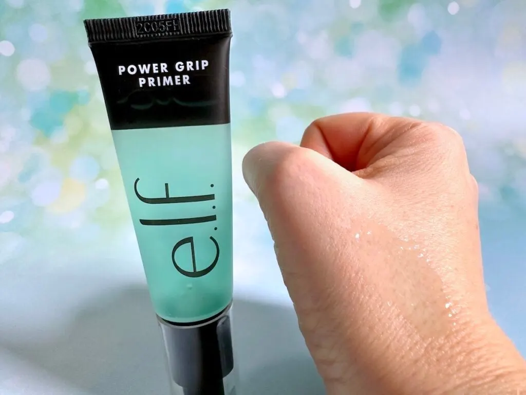 e.l.f. Power Grip Primer next to sample on hand.