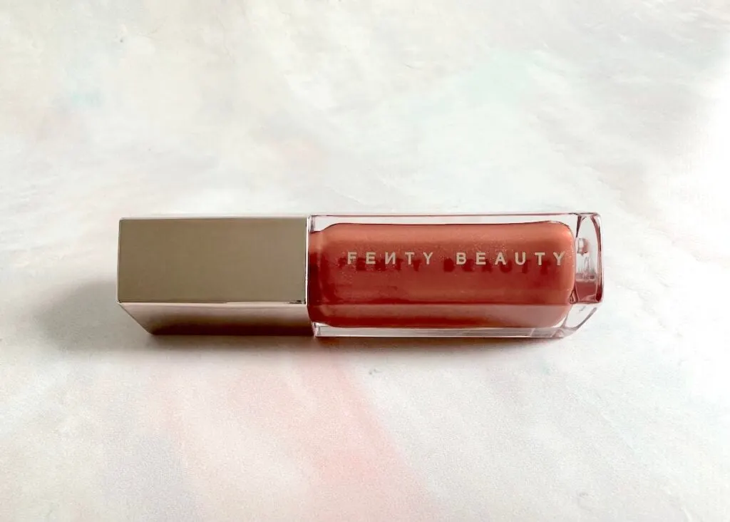 Fenty Gloss Bomb Universal Lip Luminizer in the shade Fenty Glow.