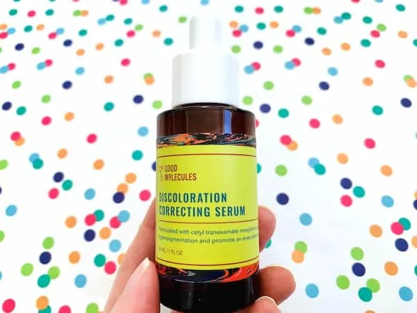 Good Molecules Discoloration Correcting Serum on colorful dot background