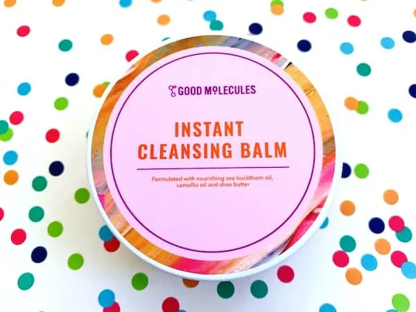 Good Molecules Instant Cleansing Balm on colorful dot background