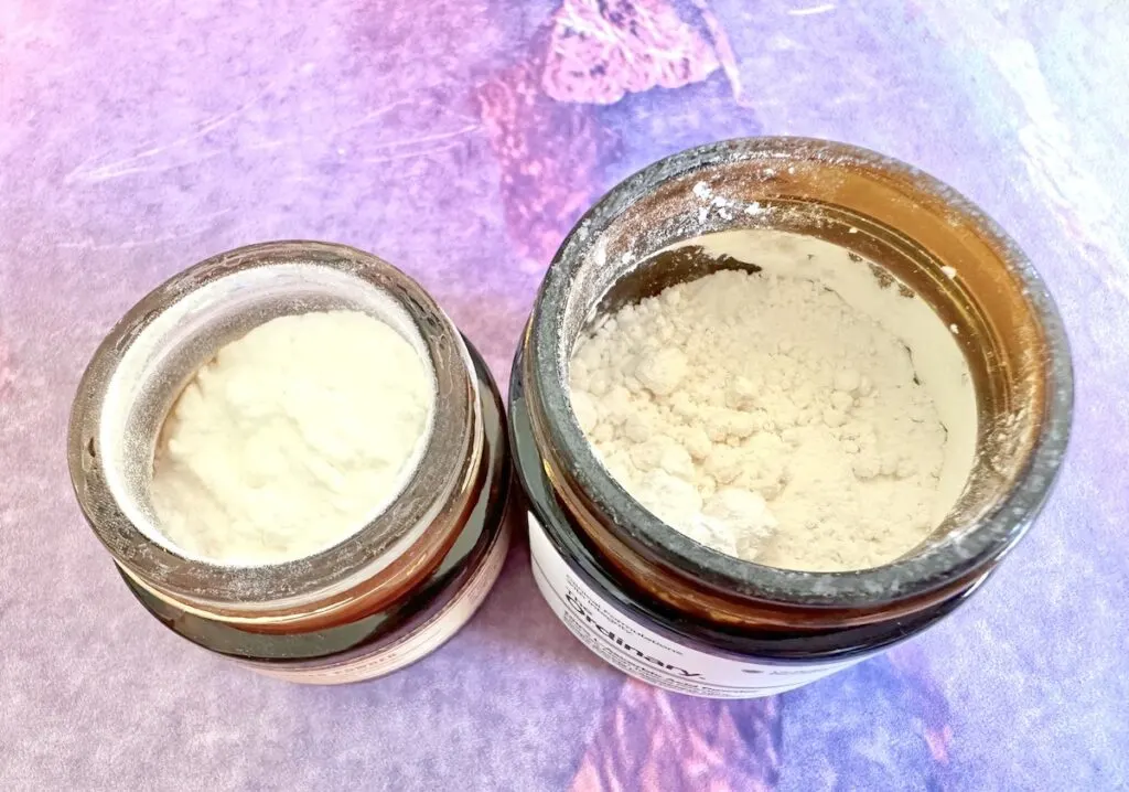 Good Molecules Vitamin C Booster Powder and The Ordinary 100% L-Ascorbic Acid Powder, open jars showing vitamin C powders inside.