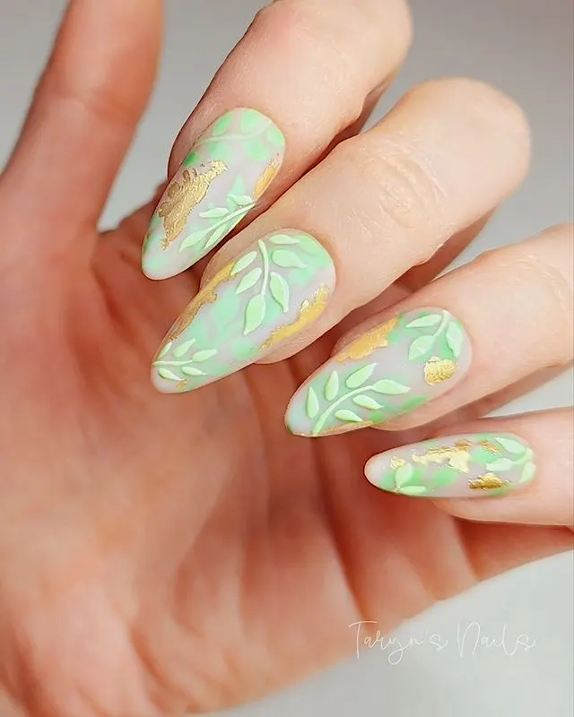 Gold and green floral spring nails.