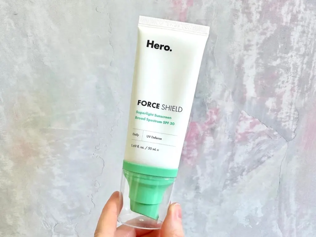 Hero Cosmetics Force Shield Superlight Sunscreen Broad Spectrum SPF 30, handheld.