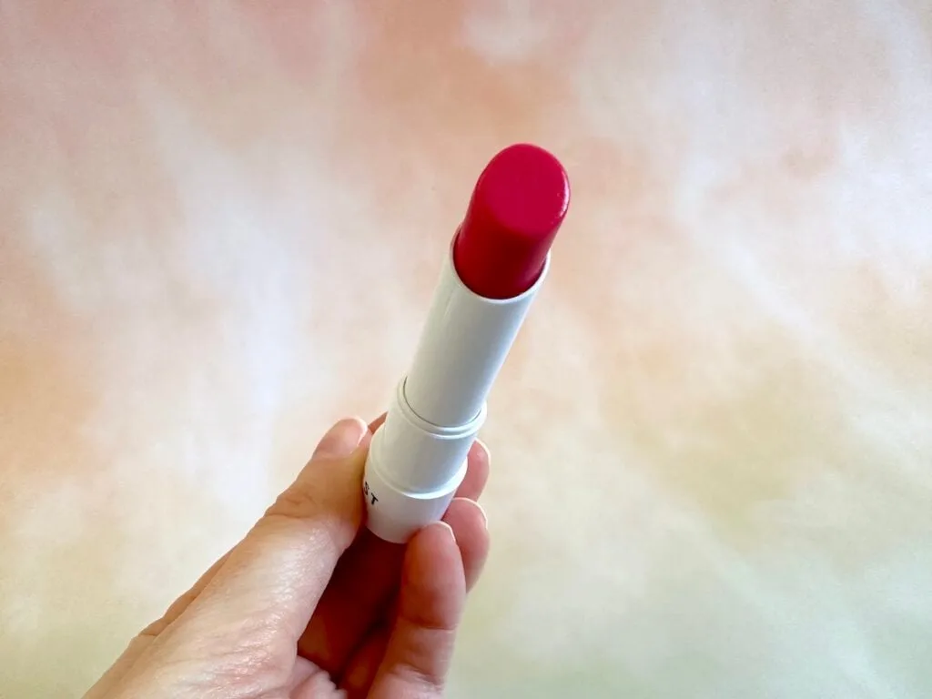 Honest Beauty Tinted Lip Balm in the shade Dragon Fruit.