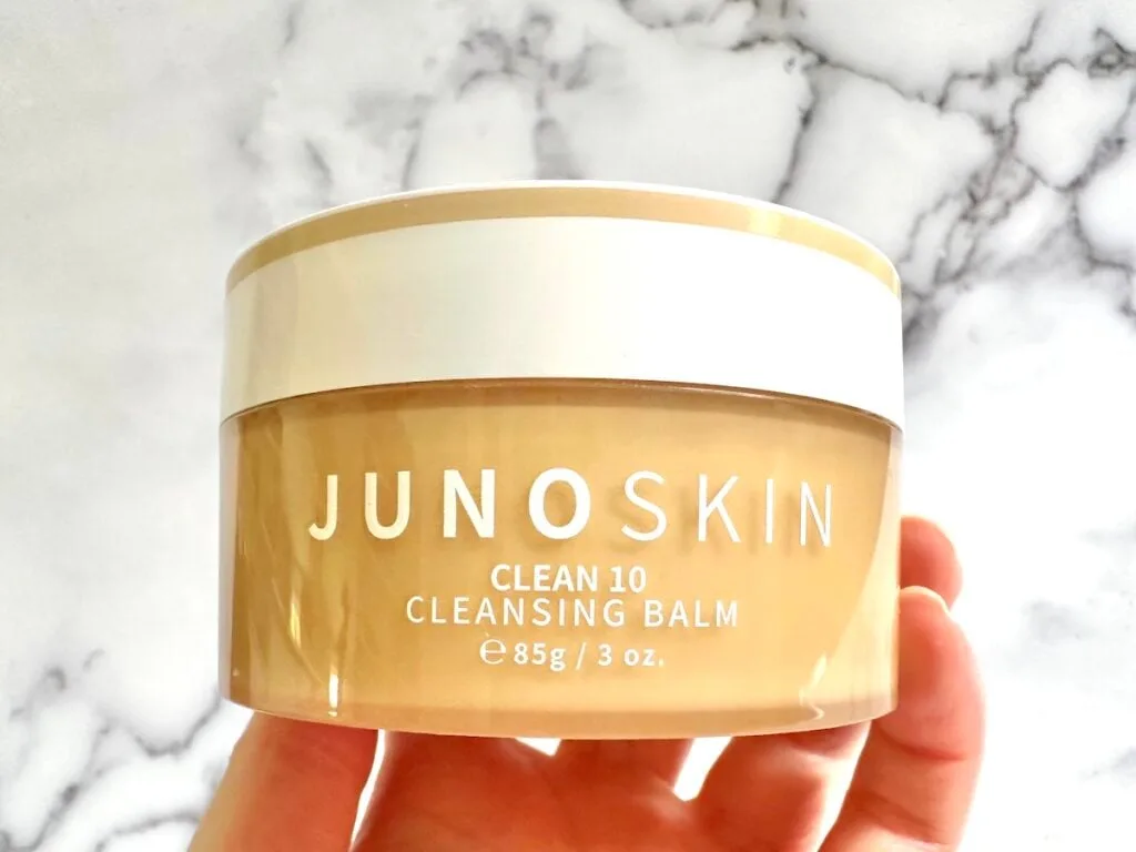 Juno & Co. Clean 10 Cleansing Balm, handheld.