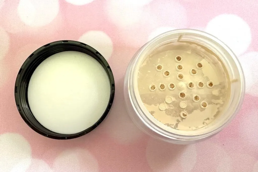 Laura Mercier Translucent Loose Setting Powder in the shade Translucent, open jar and lid.