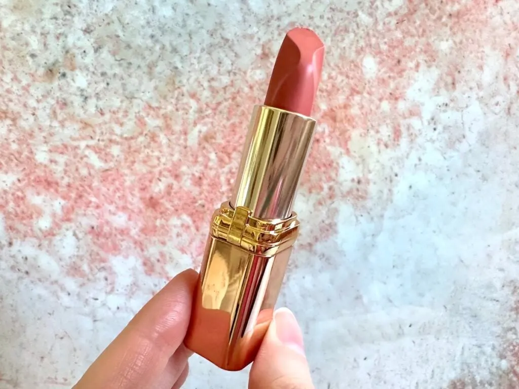 L'Oreal Les Nus by Colour Riche Intense Nude Lipstick in the shade Nu Confident, handheld.