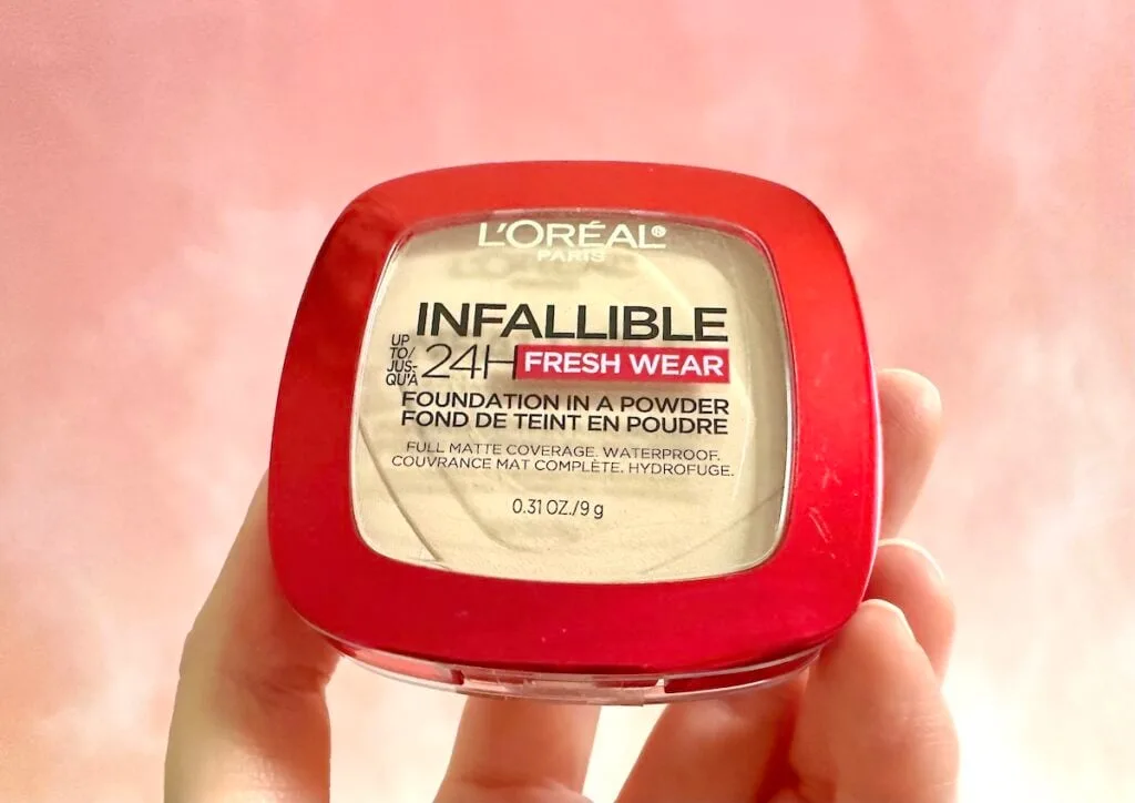 L'Oreal Infallible Up to 24H Fresh Wear Foundation in a Powder in the shade True Beige, handheld.