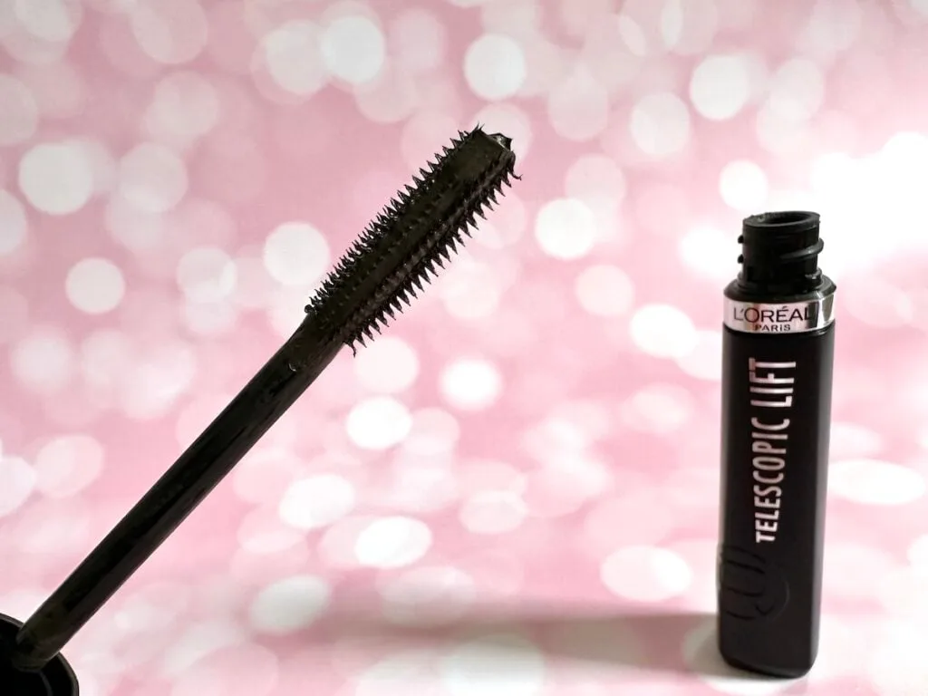 L'Oreal Telescopic Lift Washable Mascara in the shade Black Brown, open tube and longer bristles side of mascara wand.