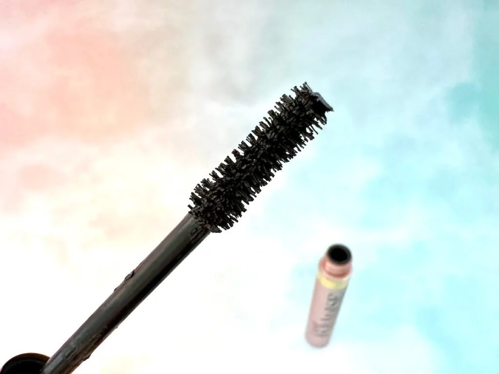 L'Oreal Voluminous Lash Paradise Mascara wand and open tube.