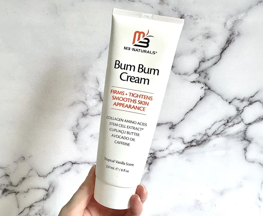 M3 Naturals Bum Bum Cream, handheld.