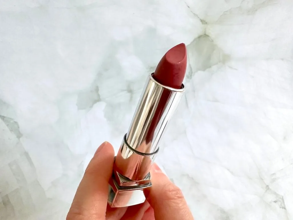 Maybelline Color Sensational Lipstick in the shade Touch of Spice, handheld.