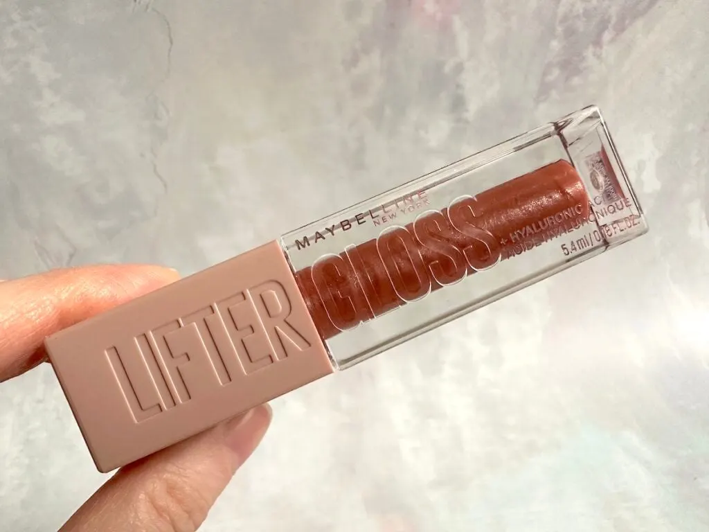 Maybelline Lifter Gloss in the shade Topaz, handheld.