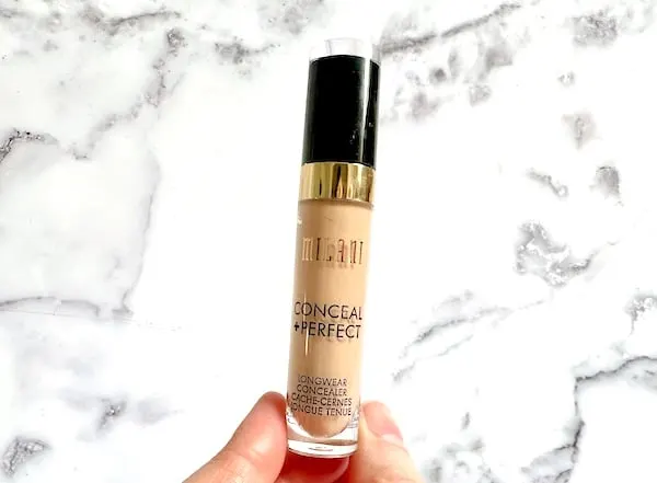 Milani Conceal + Perfect Longwear Concealer, handheld.