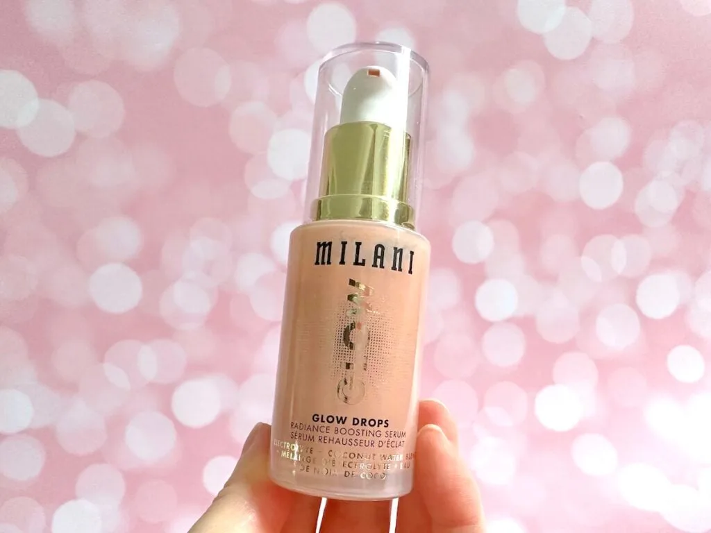 Milani Glow Drops Radiance Boosting Serum, handheld.