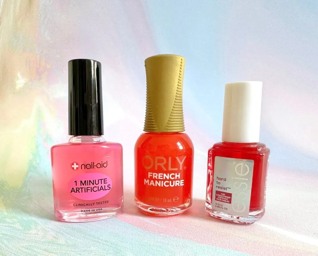 Nail Aid 1 Minute Artificials, Orly French Manicure in the shade Bare Rose, and Essie Hard To Resist Nail Strengthener Glow & Shine.