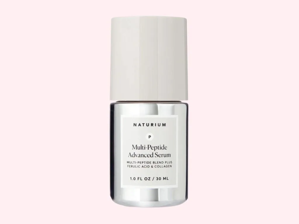 Naturium Multi-Peptide Advanced Serum on pnk background.