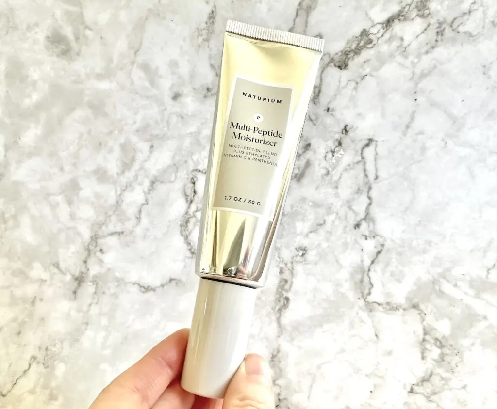 Naturium Multi-Peptide Moisturizer, handheld.