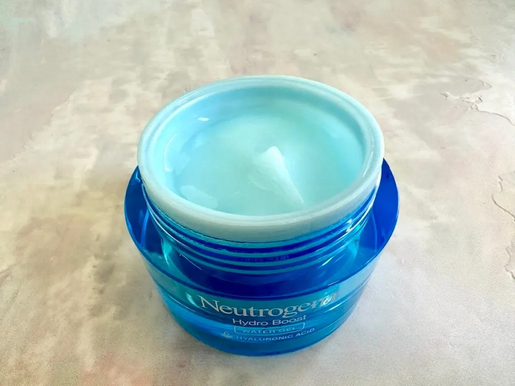 Neutrogena Hydro Boost Water Gel, open jar with light blue moisturizer inside.