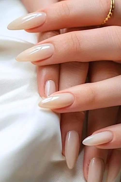 Nude almond nails.