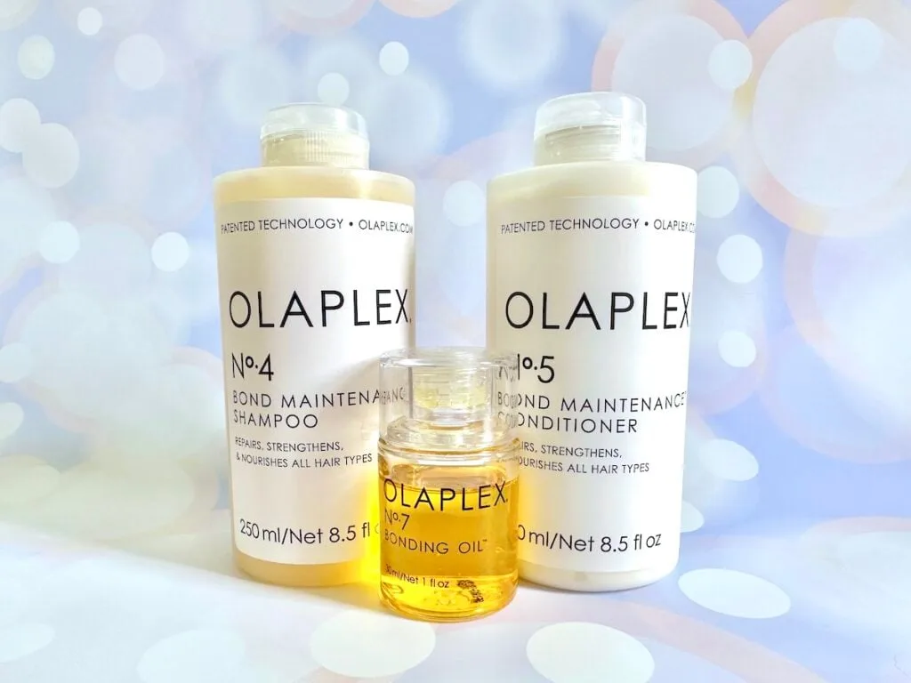 Olaplex No. 4 Bond Maintenance Shampoo, No. 5 Bond Maintenance Conditioner, and Olaplex No.7 Bonding Oil.