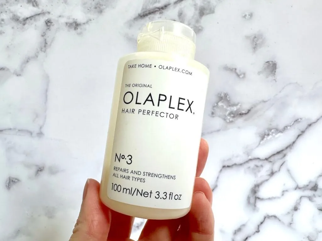 Olaplex No. 3 Hair Perfector handheld.