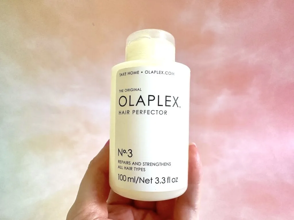 Olaplex No. 3 Hair Perfector, handheld.