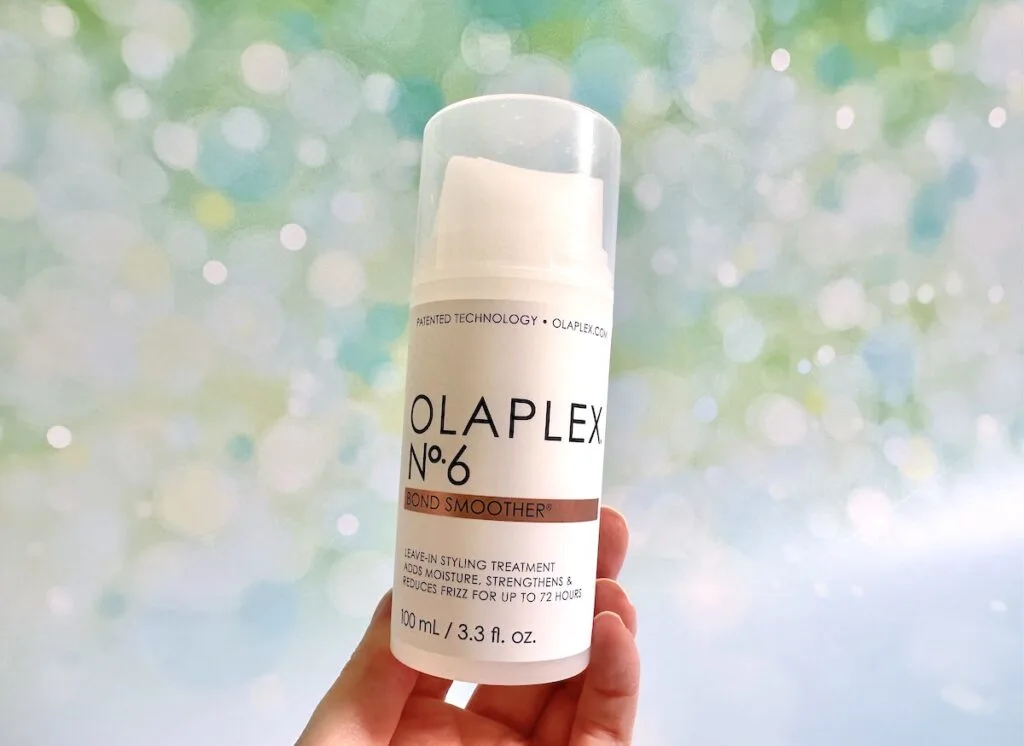 Olaplex No.6 Bond Smoother, handheld.