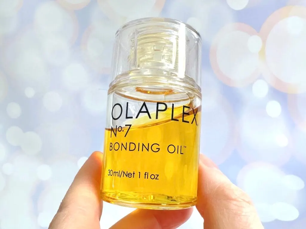 Olaplex No.7 Bonding Oil, handheld.