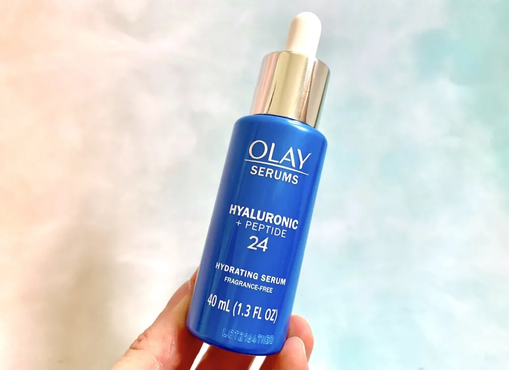 Olay Hyaluronic + Peptide 24 Serum handheld.