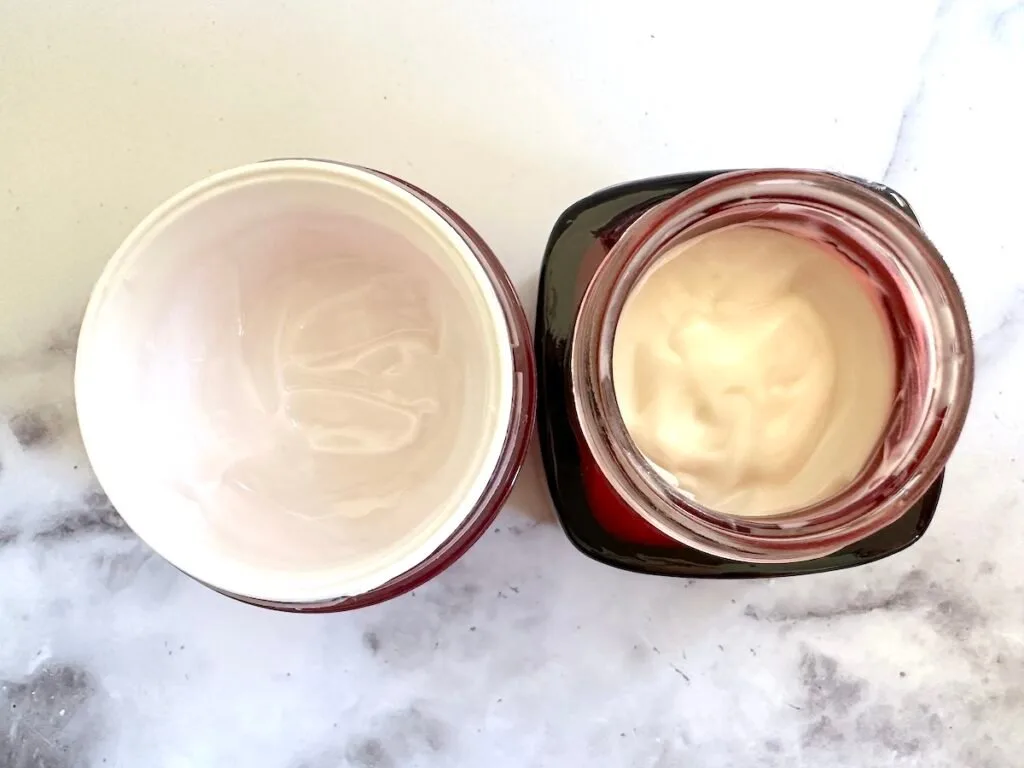 Olay Regenerist Micro-Sculpting Cream and L'Oreal Revitalift Triple Power Anti-Aging Moisturizer: open jars viewed from above.