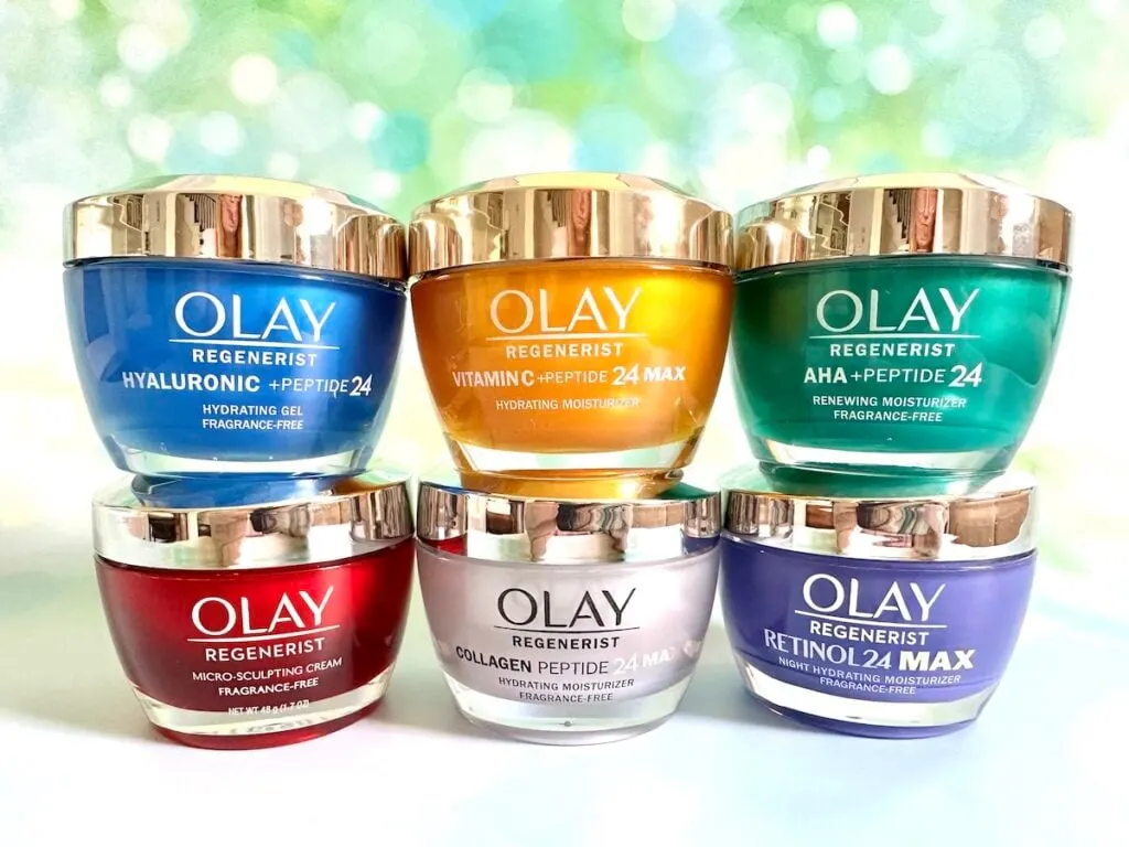 Best Olay Products for Your 40s: 6 Olay Regenerist Moisturizers stacked in two rows. Row 1: Hyaluronic + Peptide 24, Vitamin C + Peptide 24 MAX, AHA + Peptide 24. Row 2: Micro-Sculpting Cream, Collagen Peptide 24 MAX, and Retinol 24 MAX.