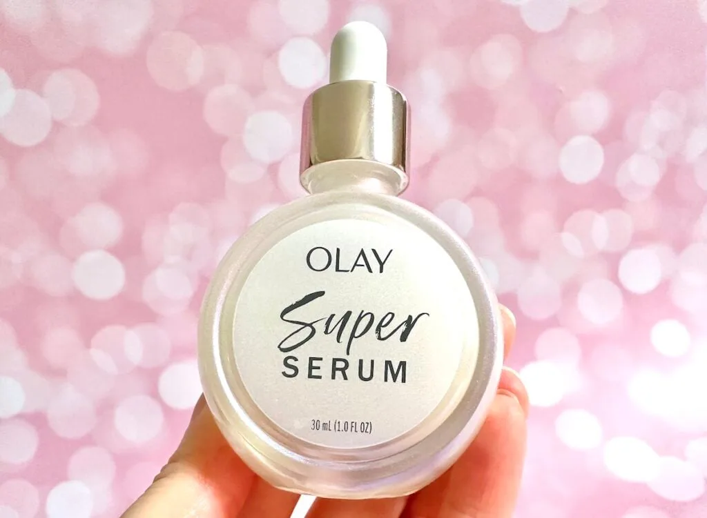 Olay Super Serum, handheld.