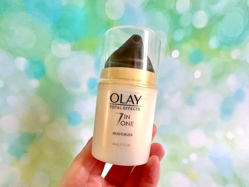 Olay Total Effects Face Moisturizer, handheld.