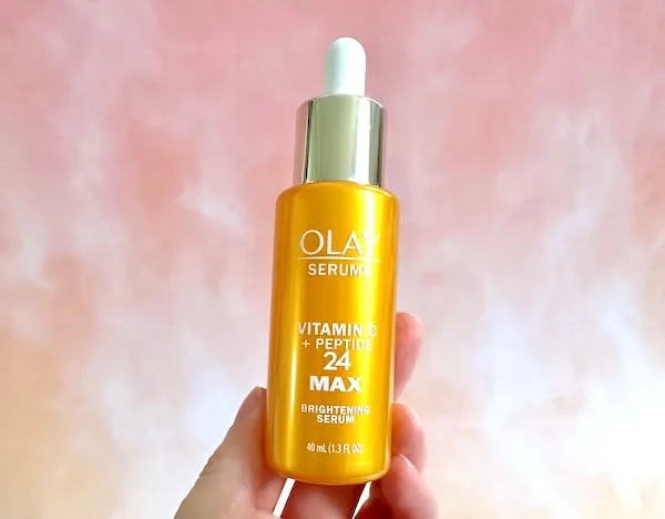 Olay Vitamin C + Peptide 24 MAX Brightening Serum, handheld.