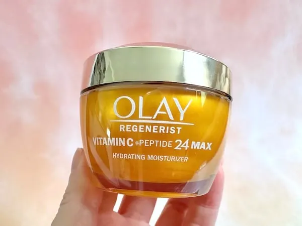 Olay Regenerist Vitamin C + Peptide 24 MAX Moisturizer, handheld.