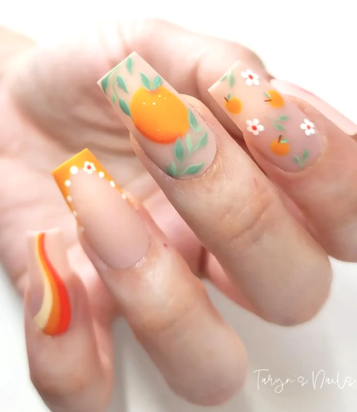 Orange fruit summer nails.