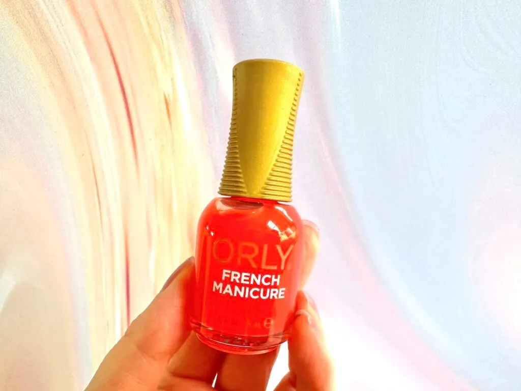 Orly French Manicure in the shade Bare Rose, handheld.