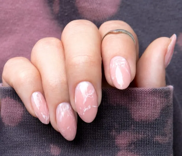 Pink marble nails.