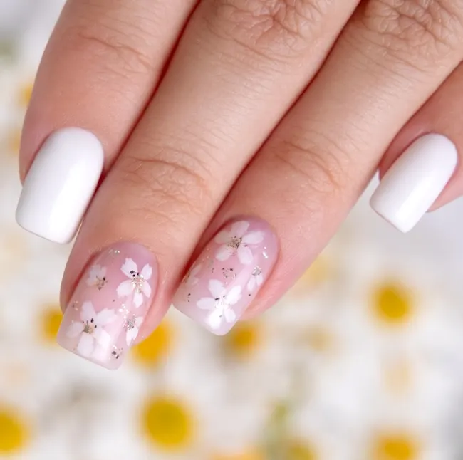 Pink and white flower nails.