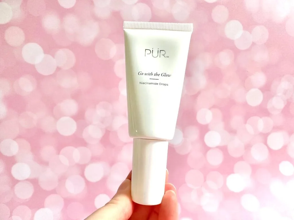 PUR Go with the Glow Niacinamide Drops, handheld.