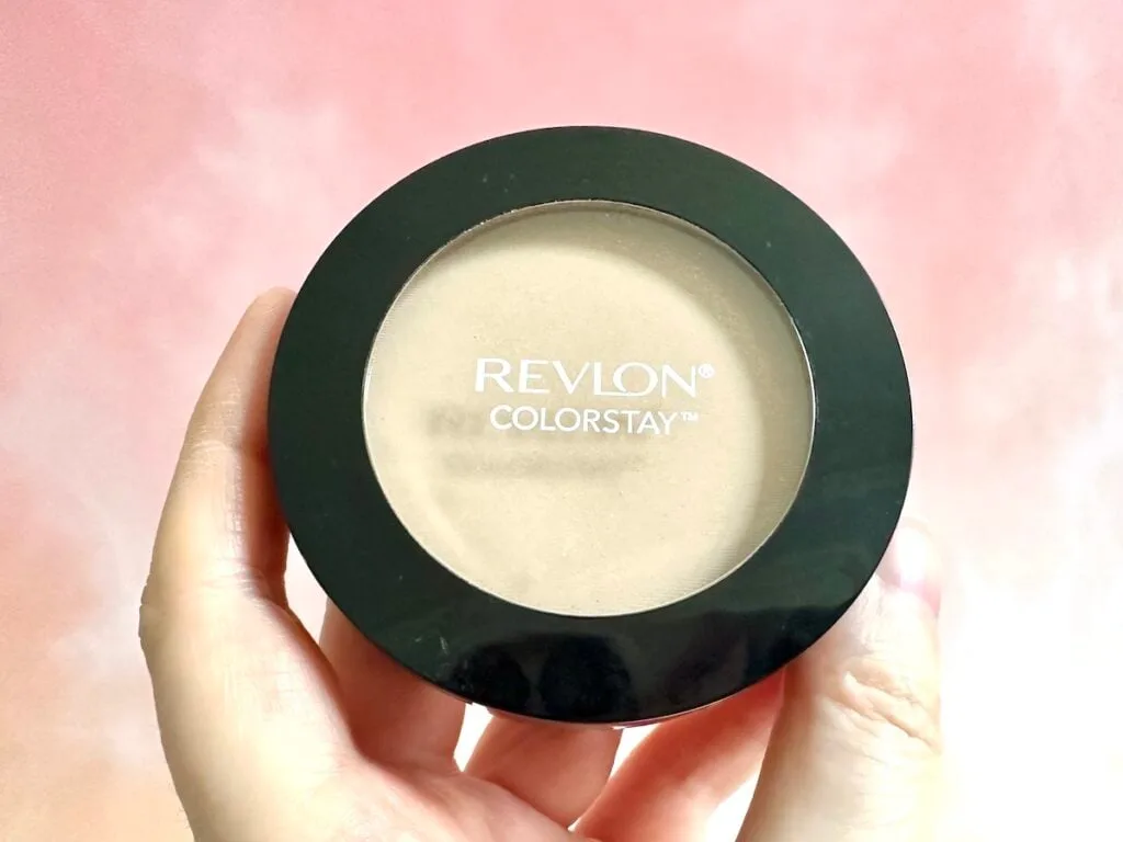 Revlon ColorStay Pressed Powder in the shade Light/Medium, handheld.