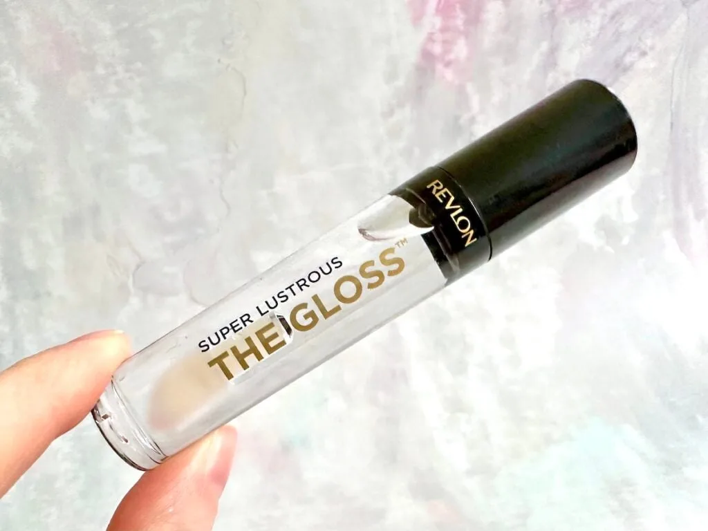 Revlon Super Lustrous The Gloss in the shade Crystal Clear, handheld.