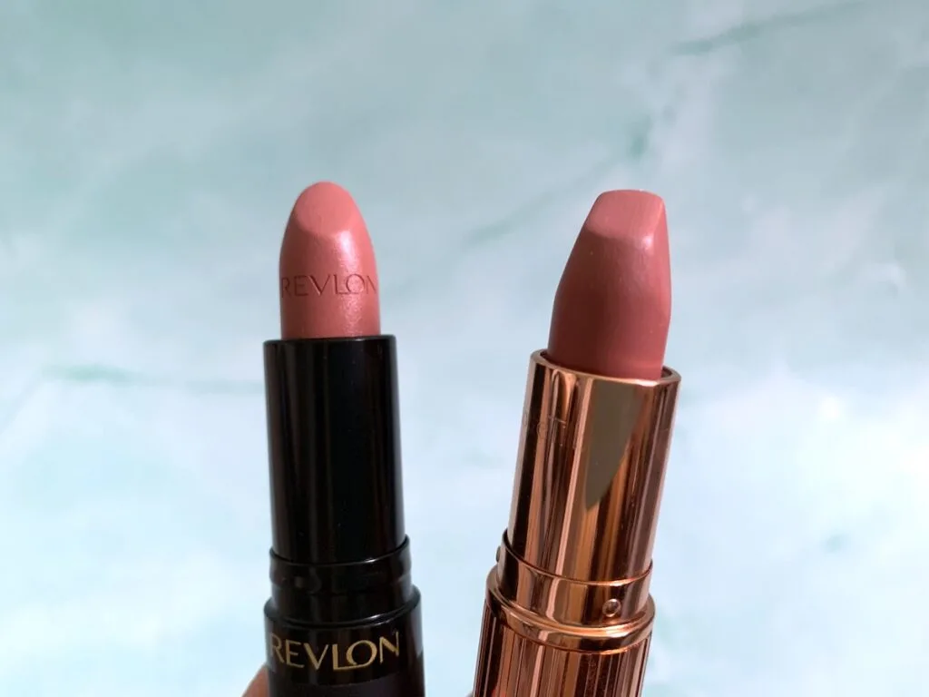 Revlon Super Lustrous The Luscious Mattes Lipstick in Pick Me Up and Charlotte Tilbury Pillow Talk Lipstick opened.