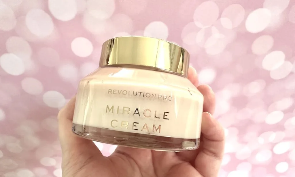 Revolution Pro Miracle Cream, handheld.