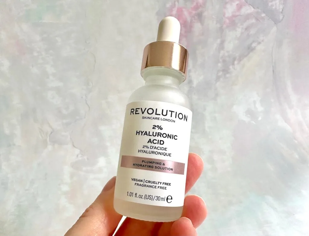 Skincare Revolution 2% Hyaluronic Acid Plumping and Hydrating Serum, handheld.