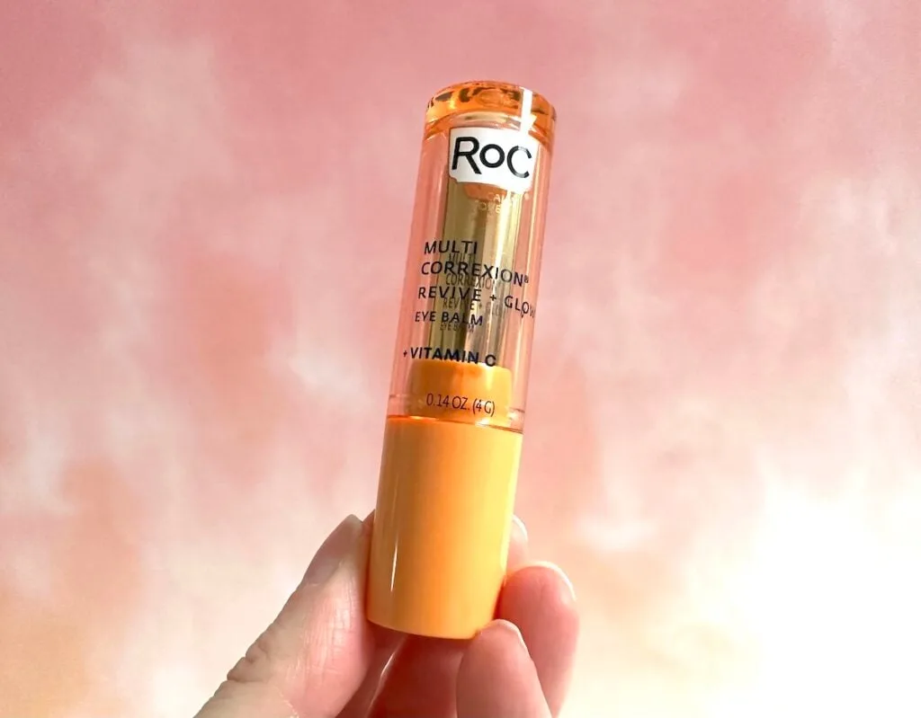 RoC Multi Correxion Revive + Glow Eye Balm, handheld.