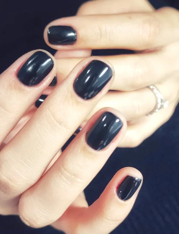 Short black glossy nails.